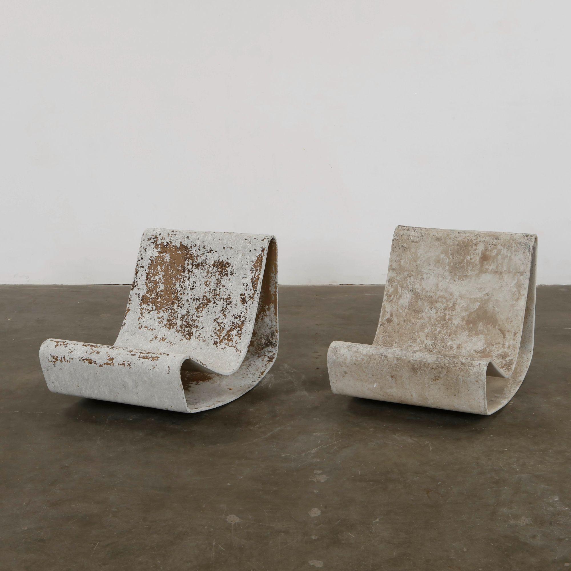 Pair of Willy Guhl loop chairs in weathered fiber cement on the Mission Road showroom floor