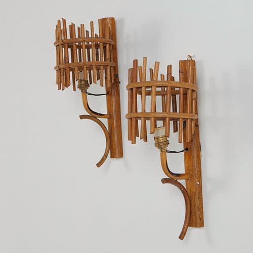Pair of Rattan Sconces by Louis Sognot, sold at Circa