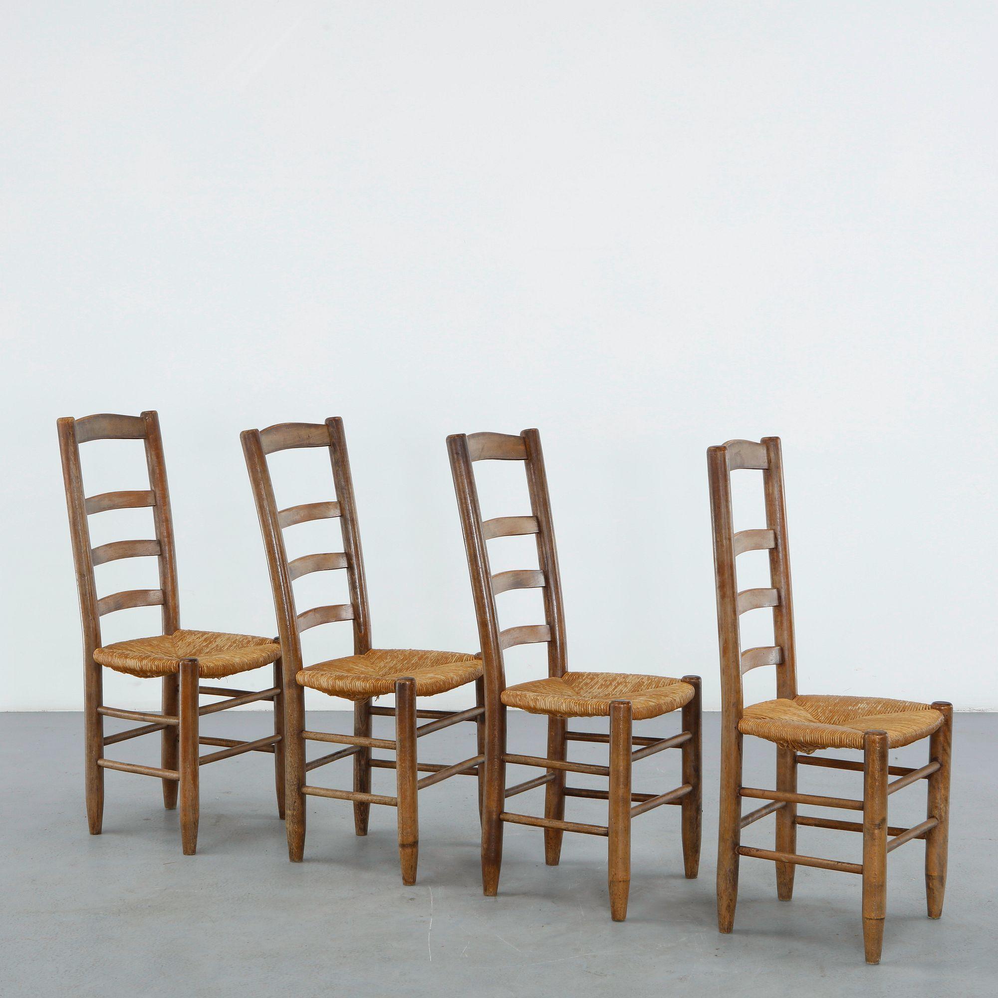 Set of Four High Back Chairs in the style of Charlotte Perriand, 1960s
