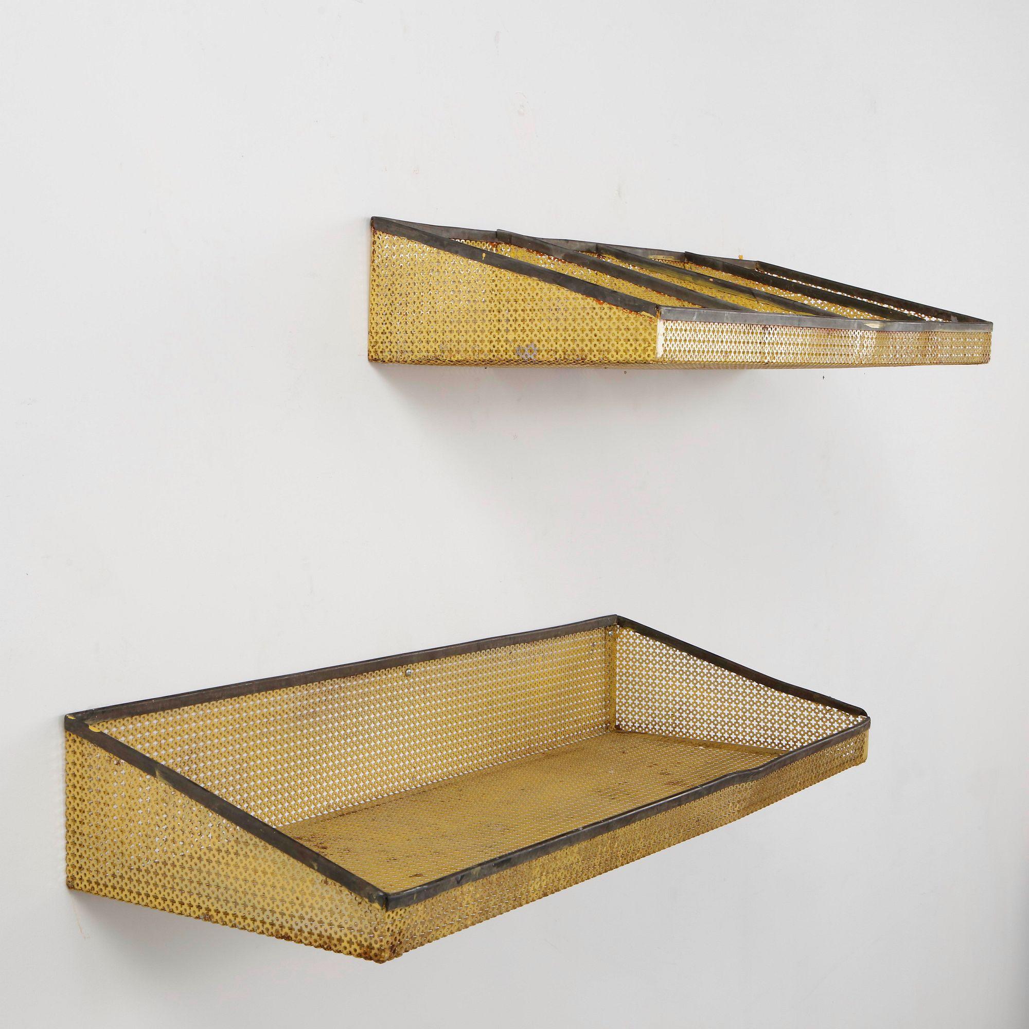 Pair of Mathieu Matégot wall shelves in yellow painted perforated sheet metal with folded edges