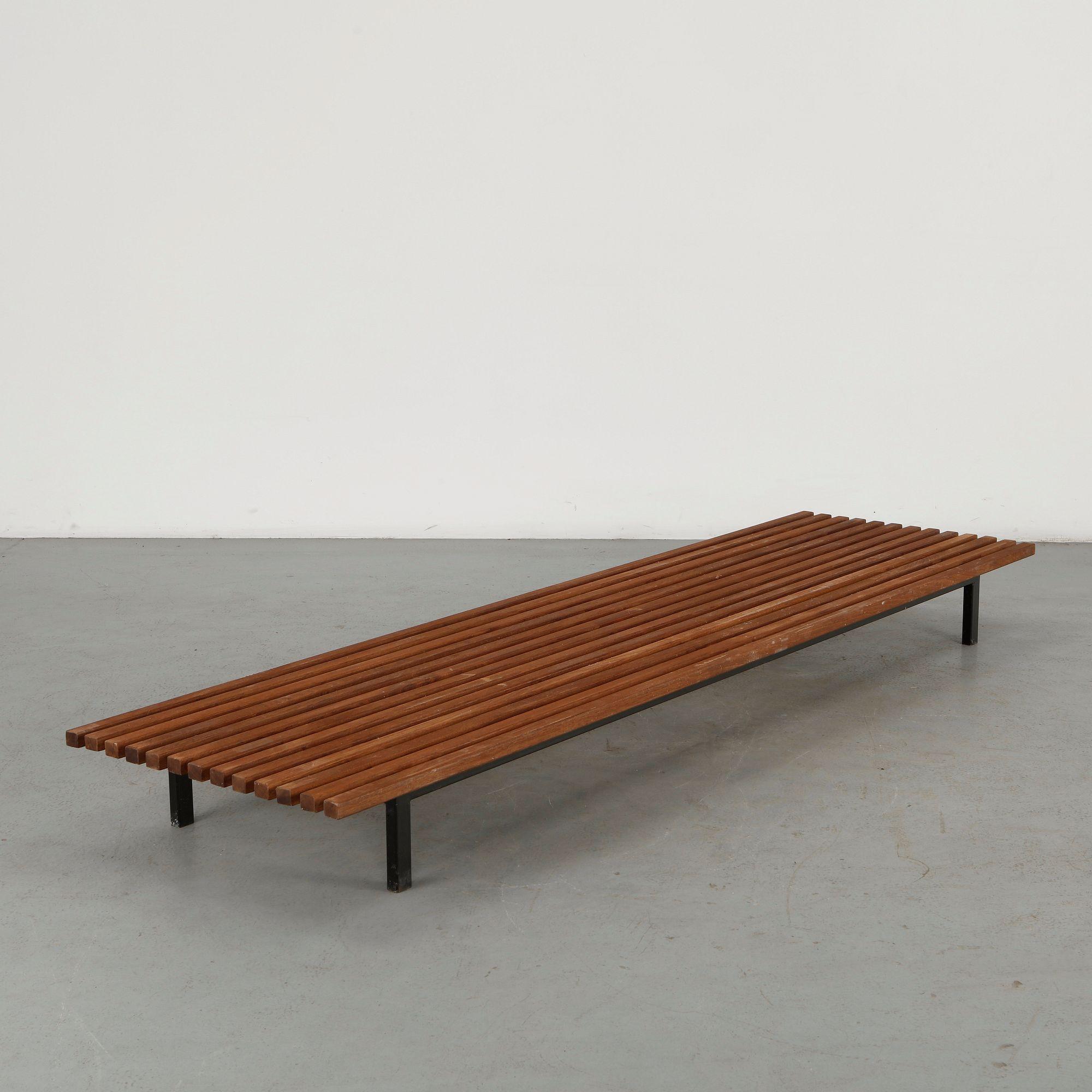 Charlotte Perriand long Cansado bench in wood, 102 inches long and 9 inches high, seen in profile