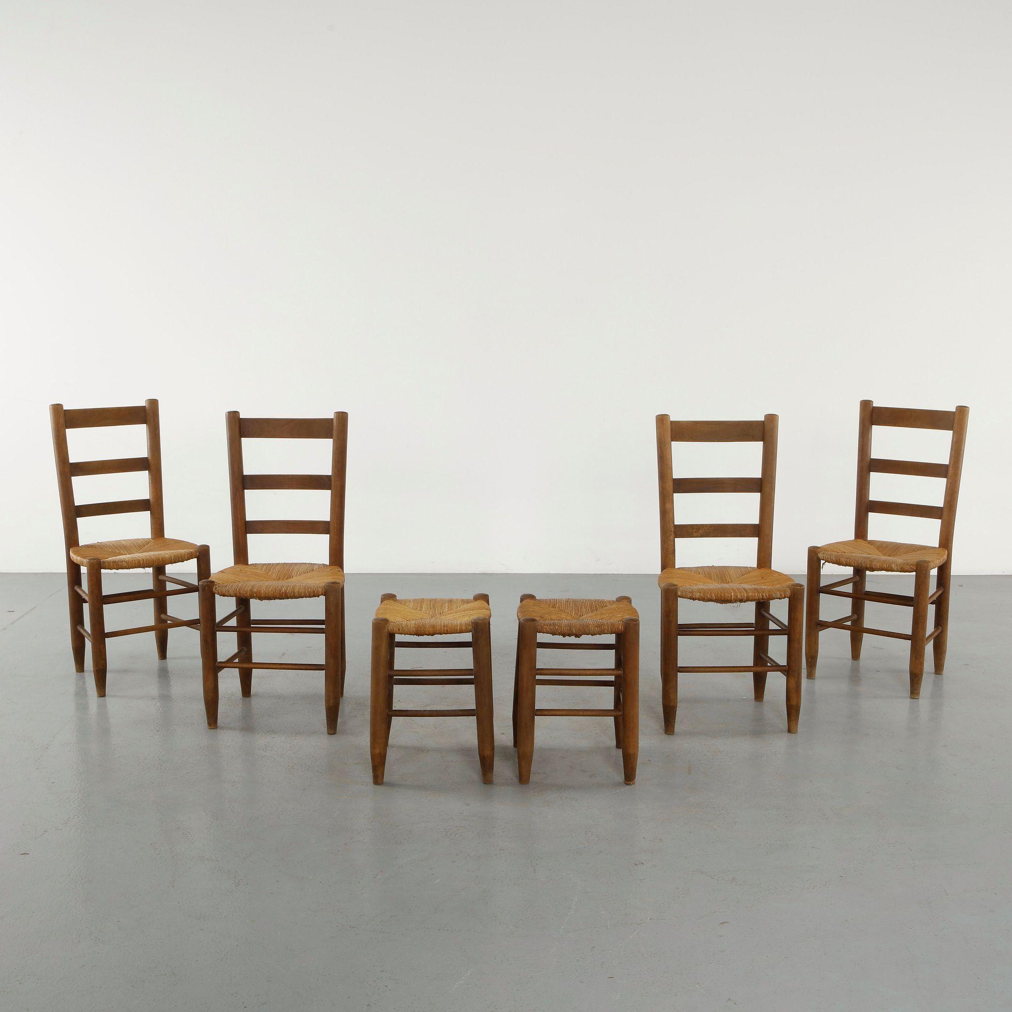 Set of Four Wood and Straw Chairs and Two Stools in the style of Charlotte Perriand, 1960s